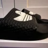 Adidas Shmoofoil Slide Badeschlappen Gr.42 (US9)