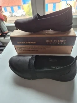 Black shoes 👞 from the brand Skechers
