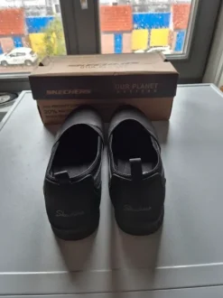 Black shoes 👞 from the brand Skechers