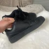 Dit zijn zwarte Nike Court Borough Low Recraft sneakers.