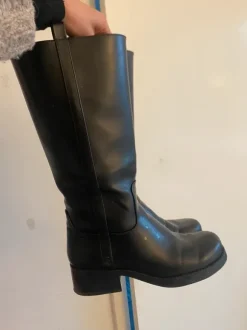 Knee high black boots