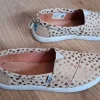 Leuke Toms crème met gouden stippen