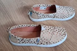 Leuke Toms crème met gouden stippen