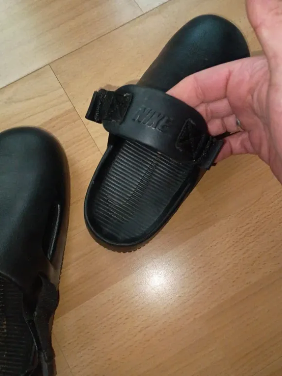 Nike mules in schwarz