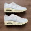 Nike shoes pink white cream