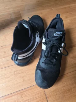 Nike Sneaker Schwarz Weiß Größe 44/45