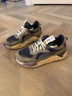 Puma sneakers.