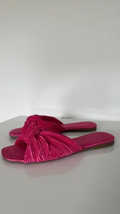Roze nieuwe slippers met knoop van Primark