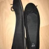 Schwarze Ballerinas