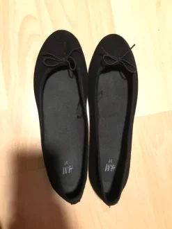 Schwarze Ballerinas
