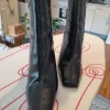 Schwarze Stiefelletten mit breitem Absatz