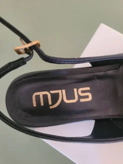 Slingpums schwarz gold