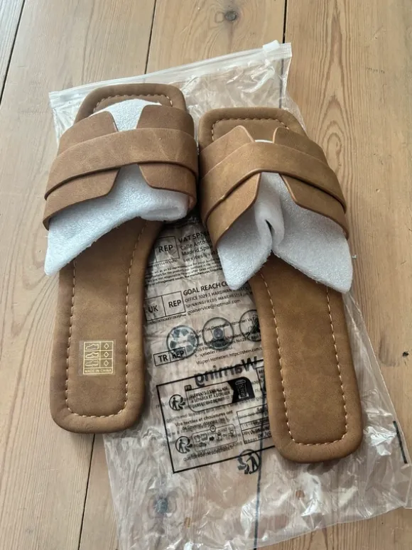 Slipper bruin