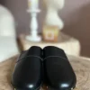 Stylische Clogs