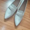 Weiße Pumps