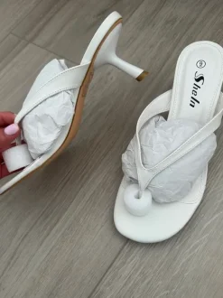Witte slipperhakken