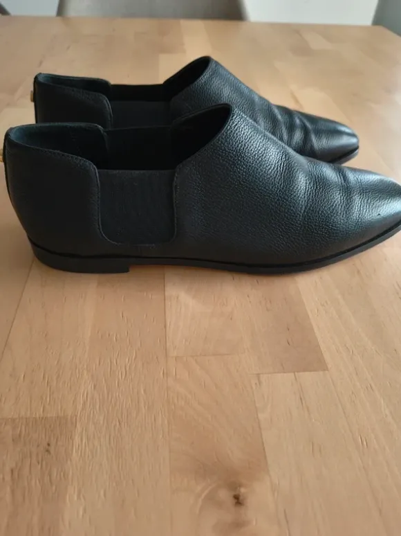 Zwarte moccasins van Jimmy Choo London